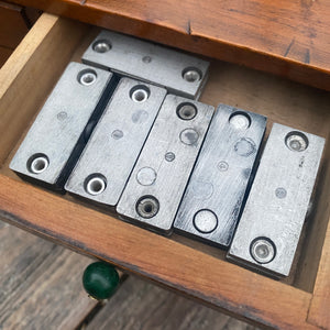 Tiny letterpress sundries cabinet with contents
